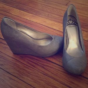 Gray wedge closed toed shoes